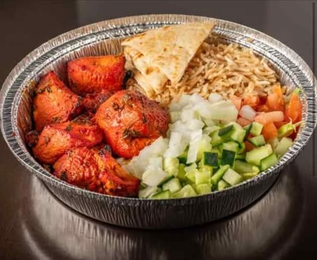Chicken Tikka Over Salad.